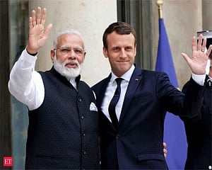Modi arrives in Paris for talks with French President Macron