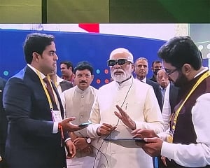 Modi drives 5G-enabled remote car, experiences AR-VR wearables