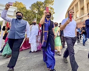 Oppn MPs take out protest march in Parliament against industrialist Adani