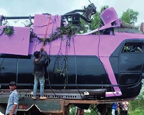 Cambodia’s tourist bus plunges off bridge, kills 13