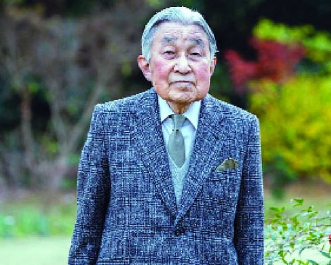 Japan’s former emperor turns 92, heart condition stable