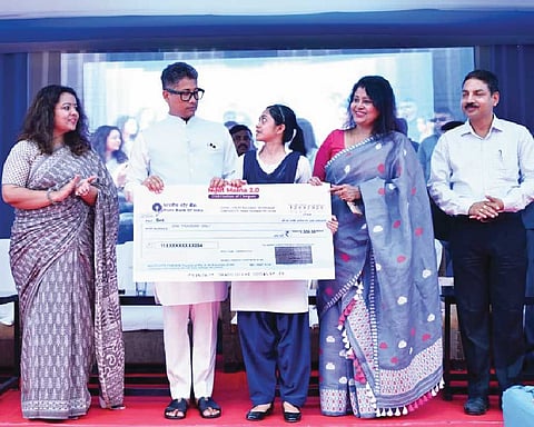 Minister Pijush Hazarika distributes cheques