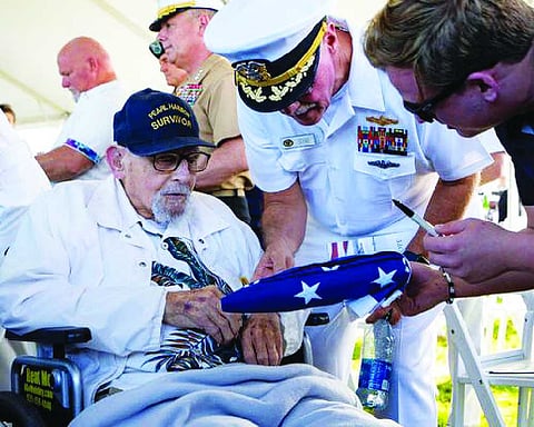 Pearl Harbor survivor,  dies at 105
