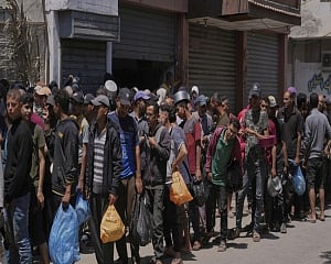 At least 21 Palestinians killed while heading to Gaza aid hub, officials, witnesses say