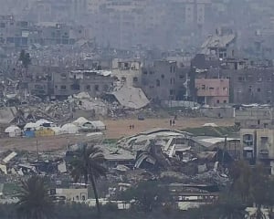 Israeli forces begin to withdraw from key Gaza corridor as part of ceasefire deal with Hamas
