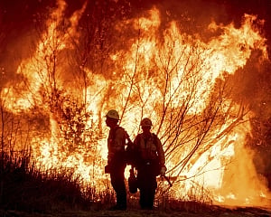 LA area's 2 biggest blazes burn at least 10,000 structures, 10 killed