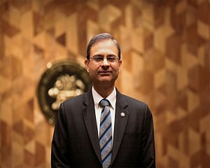 Ongoing uncertainties, frontloaded cuts, core inflation uptick led to status quo on rate: Malhotra