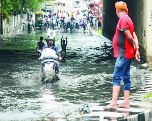 Rain cripples Capital, brings relief from scorching heat