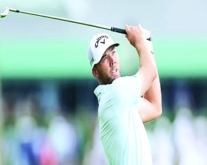 Sam Burns holds steady on soggy Oakmont to lead US Open