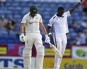 Seales routs Australia's opening batters and limits lead to 45 on day two in Grenada
