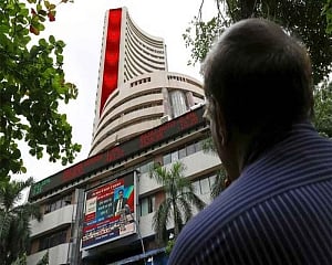 Sensex, Nifty trade flat in volatile trade amid geopolitical tensions