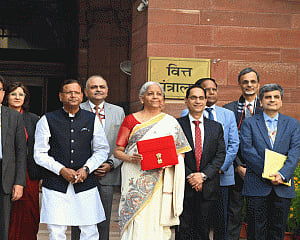 Sitharaman takes Tablet in red pouch to present paperless budget