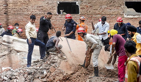 Representational image: Rescue personnel search through rubble following a building collapse. Representational image. (PTI Photo)