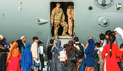 Afghanistan urges US-allied Afghans stranded in Qatar to return home