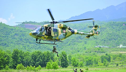 Army’s K9 warriors display combat skills in slithering exercise