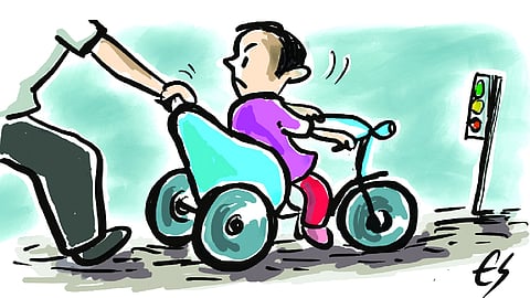 At the traffic signal: A child’s fight for a tricycle