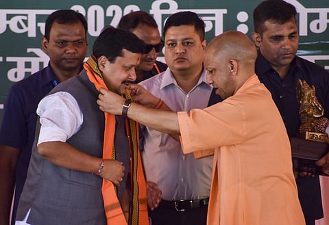 Uttar Pradesh Chief Minister Yogi Adityanath felicitates BJP national president Nitin Nabin during the Shakti Kendra Convenor Conference (western region), MEERUT on Monday, September 21. (PTI Photo)
