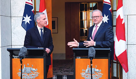 Canada, Australia leaders urge de-escalation