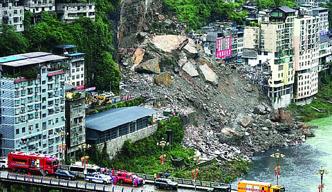 China: Rescuers race to find survivors after landslide