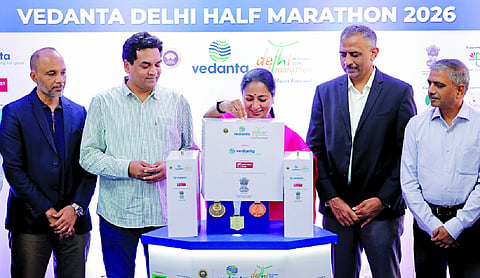 CM Rekha Gupta unveils finisher medal for Vedanta Delhi Half Marathon 2026