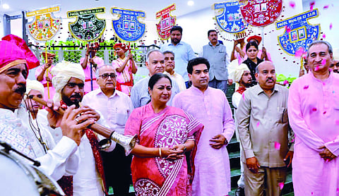 CM Rekha honoured with traditional floral fan