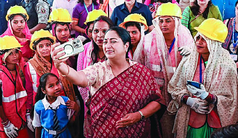 CM Rekha unveils slew of welfare measures for workers