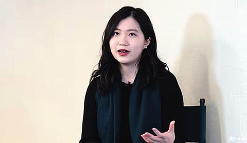 Exiled activist vows to keep fighting after Hong Kong jails her father