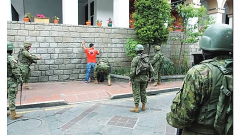 Gunmen in military uniforms storm a rural Ecuador property, killing 7