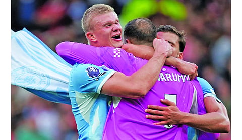 Haaland’s disputed goal wins Manchester derby for 10-man City against United