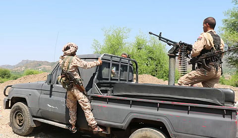 Saudi-backed Yemeni government forces patrol a road leading to a frontline where they are engaged in clashes with Iran-aligned Houthi fighters, Sept. 30, 2026. (Ebrahim Al-Suhaibi/Reuters)