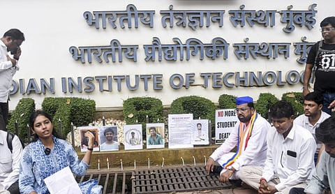Demonstrators hold a candlelight vigil in Mumbai on Monday to mourn the students who died by suicide at IIT Bombay. Photo: PTI