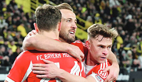 Kane scores 2 more as Bayern beats Dortmund