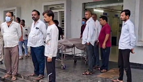 Police personnel conduct an investigation as they arrive at a hospital after six persons died, and as many as five others fell ill following alleged consumption of spurious liquor, in Sagar district, Madhya Pradesh, Sunday, Sept. 6, 2026. (PTI Photo)
