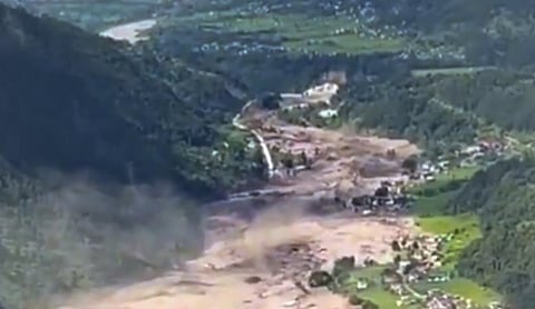 File photo: In this screengrab from a video posted on August 26, 2026, floodwaters flow through a mountainous area after a sudden flood in Nepal. (@NepalPoliceHQ/X via PTI Photo)