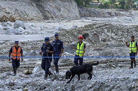 File photo: Nepal Police personnel conduct a search operation following flash floods in Nepal. (@NepalPoliceHQ/X via PTI Photo), KATHMANDU.