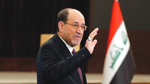Nouri Al-Maliki is defiant after Trump threatens