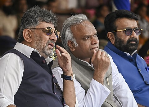 File photo: Karnataka Minister Priyank Kharge with Chief Minister D K Shivakumar and others during a police training programme in Bengaluru on August 28, 2026. (PTI Photo)