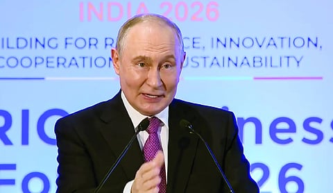 Putin takes swipe at G7