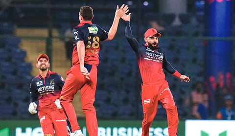 RCB thrash DC by nine wickets