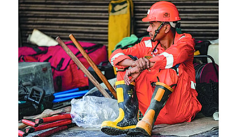 Rescuers race against time at hostel collapse