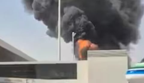 **Caption:**  Flames and smoke rise from Riyadhs King Khalid International Airport after an attack. (Photo: AP)