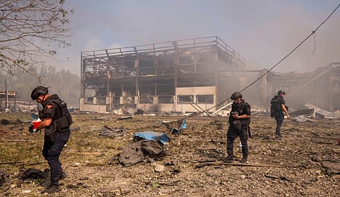 Russian attack struck a warehouse, followed by an explosion, in the village of Myla, Kyiv region, Ukraine. (AP Photo/Dan Bashakov)