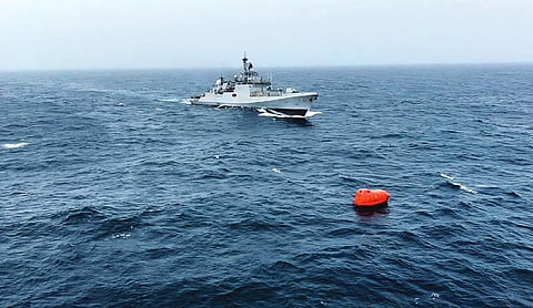 Searchers find one crew member from capsized ship