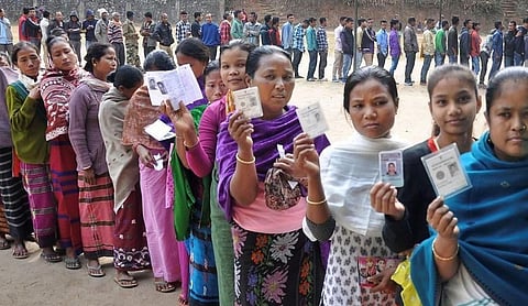 Representational image: Voters queue holding identity documents. (PTI Photo)