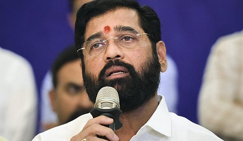 File photo: Eknath Shinde speaks into a microphone. (PTI Photo)