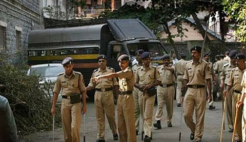 Representational image: Policemen standing in a line on a barricaded street. (PTI Photo)