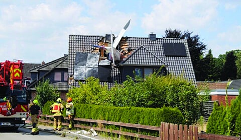 Small plane crashes into German home, 1 dead, 1 missing