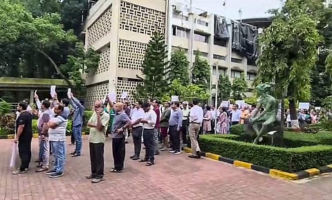 Faculty members of IIT-Bombay hold a march on the campus in support of Suryanarayana Doolla, who was removed as dean of administrative affairs, Mumbai on Monday, September 21. (PTI Photo)