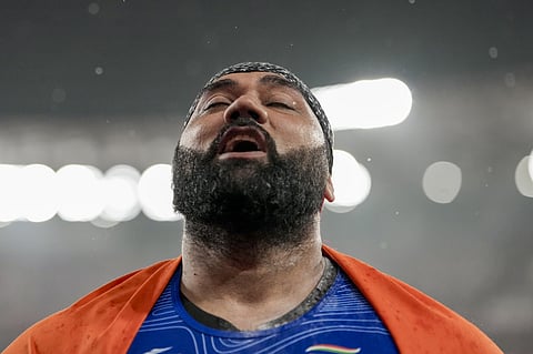 Tajinderpal Singh Toor celebrates his Asian Games shot-put silver in Nagoya. (PTI Photo/Arun Sharma)