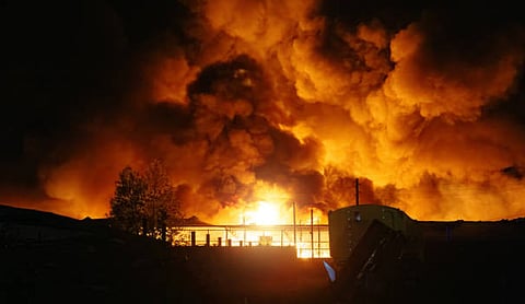 Ukrainian drone strikes kill seven warehouse workers, trigger fire at oil depot in Russia
